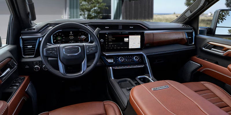 2026 GMC Sierra 2500 HD Denali interior featuring a premium dashboard and leather cabin