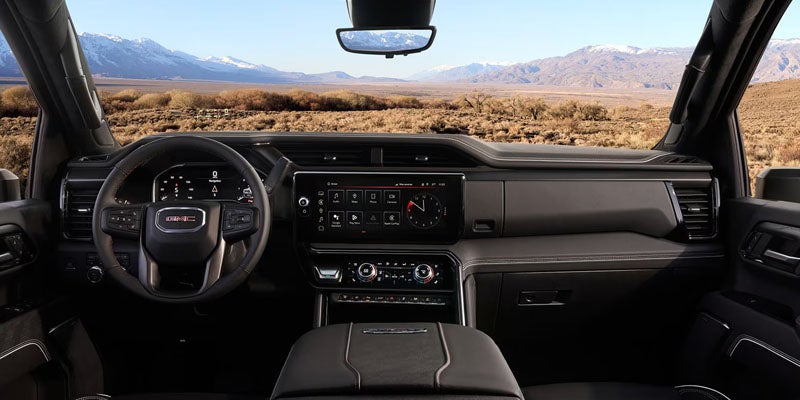 Driver-focused interior of the 2026 GMC Sierra 2500 HD Pro with advanced safety technology